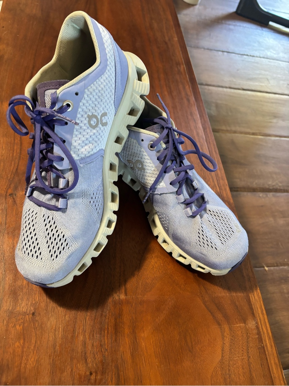 On Running Lavender and Purple Women's Running Sneakers.